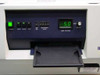 Dynatech Fluorolite 1000 – front control panel detail showing Power, Zero, Blank, Run buttons, Reference Sel and Reference Value switches, and Lamp Voltage digital display reading 5.0