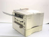 Canon H12013 LaserClass 7000 plain paper laser fax machine — front left three-quarter view showing document feeder tray and paper output