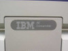 Close-up of IBM PC Convertible badge on front of unit showing IBM logo and 'PC Convertible' nameplate