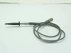 Tektronix S-265 1:1 oscilloscope probe shown full length with grabber hook tip attached and coiled gray cable terminating in BNC connector