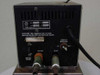 Fisher Scientific Water Bath Model 80 — close-up of rear panel showing inlet/outlet hose barb ports, motor speed dial, circuit breaker switch, and Fisher Scientific rating plate