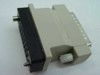 Racal 27C522-02 DSU CSU modem adapter – angled side view showing DB25 male connector and 34-pin female IDC connector housing