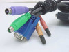 Aten 2L-1701P KVM cable — close-up of computer end showing purple PS/2 keyboard, green PS/2 mouse, blue HDB-15 VGA, red and tan 3.5mm audio connectors