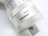 Close-up of Mitutoyo micrometer head thimble showing '0–1" .0001"' range/resolution markings and Mitutoyo logo