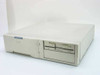 Dell OptiPlex 466/LN 486 desktop PC — front view showing 5.25" and 3.5" floppy drives, Dell logo, and beige low-profile case