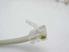 RJ-45 connector on the coiled cable of the Decision Data 122RX31S-1E terminal keyboard