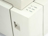Apple Personal LaserWriter LS — right-side panel close-up showing LocalTalk port slot and front indicator lights panel with power and status LEDs