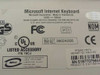Microsoft Internet Keyboard X08-01062 bottom label showing 5V DC 100mA power rating, FCC, UL, CE certifications, Made in Thailand, and MS Part No. X08-01062