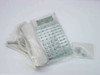 NEC DTP-32D-1 Dterm Series E 32-button white display telephone sealed in original plastic wrap with accessories pouch