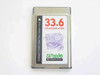 Simple Technology 33.6 Communicator PCMCIA modem — front label showing 33.6 kbps, V.34bis, Data, Fax, Cellular, Voice