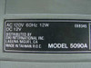 EIKI 5090A rating plate: AC 120V 60Hz 12W, DC 12V, Model 5090A, distributed by EIKI International Inc., made in Taiwan R.O.C.