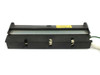 Ceramic heating element assembly side profile view showing black housing with three brush-style contact slots and green ground wire