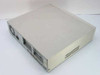 AST Bravo MS P/100 desktop computer rear-right view showing back panel with power supply fan, IEC inlet, and expansion slot covers