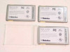 US Robotics Megahertz CC1336 PCMCIA modem cards rear label view — showing FCC, CSA, UL certifications and PC Card designation, three units