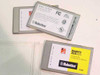 US Robotics Megahertz CC1336 PCMCIA modem cards rear label and front label view — FCC certification and 33.6Kbps Megahertz branding visible