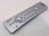Philips Magnavox UM4 universal remote control — front face showing full silver button layout with navigation cluster and device mode keys