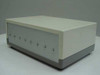 Brushless 3-phase motor controller rear view showing 7 panel-mount connectors and enclosure in cream and gray benchtop housing