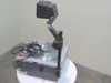 3M 9000AJB 9100 Overhead Projector side profile with arm fully extended and angled, showing folding arm joints, projector head, and lens assembly