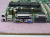 Intel AA 718142-207 motherboard rear I/O panel showing PS/2 ports, USB ports, serial ports, parallel port, and VGA connector