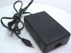 HP C7296-60024 AC adapter – top and right side view showing HP logo and overall unit condition