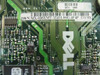 Dell MX-036XMT label close-up showing part number DS/N MX-036XMT-12411-06G-4F4P and REV A00 sticker
