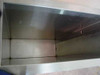 Interior view of Photosonic stainless steel tank — looking down into clean stainless interior showing welded seams and bottom-mounted transducer plate
