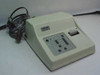 Grason-Stadler GSI 28 Auto Tymp tympanometer – front three-quarter view showing control panel, thermal printer slot, and attached probe cable