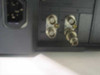Philips LTC2813/60 rear panel close-up showing IEC AC power inlet and four BNC video connectors (two pairs for dual A/B inputs with loop-through)