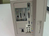 Compaq Presario 3060 rear panel view showing serial, parallel, audio, PS/2, modem, and network ports with expansion card slots
