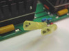 Close-up of yellow insulated quick-disconnect spade terminals on the DB48-24S-2 board — male and female connectors visible