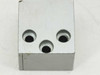 SMC MY1H25G-300H-Z73L cylinder – bottom port face showing three pneumatic port openings in aluminum block