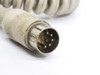 DEC RT101+ 5-pin DIN male connector close-up showing five pins and grime buildup on coiled cable barrel