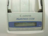 Canon MultiPass C530 front panel close-up showing LCD display reading PLEASE WAIT, Printer Fax Copier Scanner label, and Alarm indicator