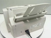 Canon MultiPass C530 rear view showing paper input tray open, power cord attached, and rear port area