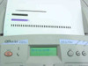 HP OfficeJet K80xi control panel close-up showing LCD display reading Initializing and ADF with printed test page
