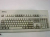 Dell AT101W PS/2 keyboard close-up top-down view showing full QWERTY key layout and Dell logo