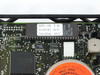 Iomega Beta 150A – PCB closeup showing BETA 150 T.48 firmware sticker with part number 01949203 (H/A) and CheckSum 3025