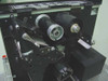 Zebra Z90GM – interior mechanism view showing ribbon supply spindles, drive rollers, and print head assembly