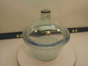 Wheaton Dry Seal vacuum desiccator assembled – front view showing domed glass lid with stopcock valve seated on glass bowl with blue rubber gasket