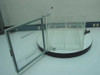 Plas Labs acrylic desiccator cabinet with front door fully open, showing aluminum-framed door panel and interior tray shelf