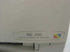 Canon BJC-250 Color Bubble Jet Printer close-up of front badge showing model name and Bubble Jet logo