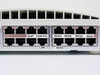 3Com 3C16754 rear port close-up showing LAN, SHIP, TRAFFIC, REG1, REG2, REG3, REG4, and REG5 labeled RJ-45 ports