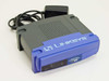 Linksys EFSP42 EtherFast 10/100 2-Port Print Server – three-quarter front view with power adapter
