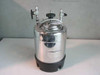 Apache Stainless 90-5304 stainless pressure vessel — front-right view showing bail clamp handle, multiple top-head fittings, and polished 304L stainless body with stamped label