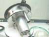 Headway Research CB15 motor/bowl assembly side view — stainless steel bowl, cylindrical motor body with vacuum ports and brass fittings, green tubing attached