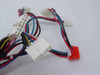 Delta Electronics DPS-145PB-4 145W power supply — close-up of output wiring harness showing multi-pin proprietary, Molex, and red Berg connectors