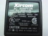 Xircom AC Adaptor label showing Part No. 2000113B, Model AD-1250, Input 120VAC 60Hz 9W, Output 12VDC 500mA, UL and CSA markings
