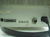 Decision Data 3597 C1014A rear panel showing DB25 port, 5-pin DIN connector, Revision 1110 label, ordering number C1014A label, and attached power cord