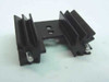 Aavid black TO-220 heat sink – front view showing fin array, two mounting holes, and PCB pins