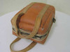 Retro-Ray triple prism leather carry case — exterior showing wear to seams and canvas straps with shoulder strap